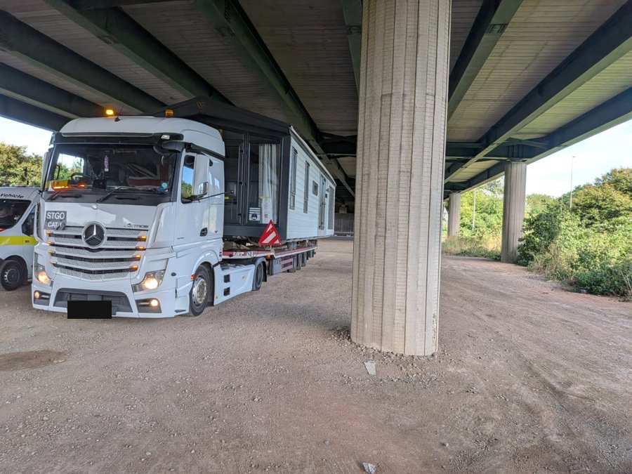 STGO Category 1 plated vehicle carrying a wide load